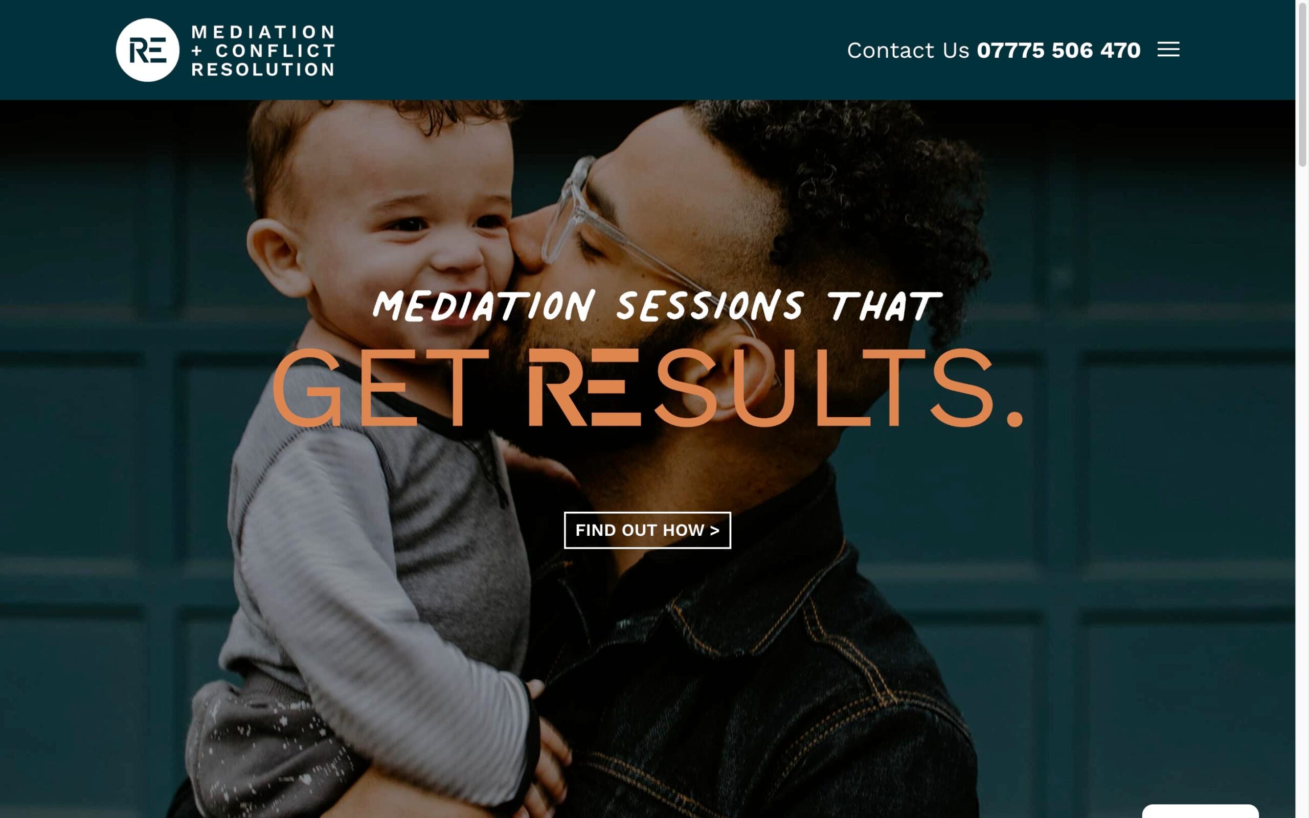 Father holding smiling child promoting mediation services